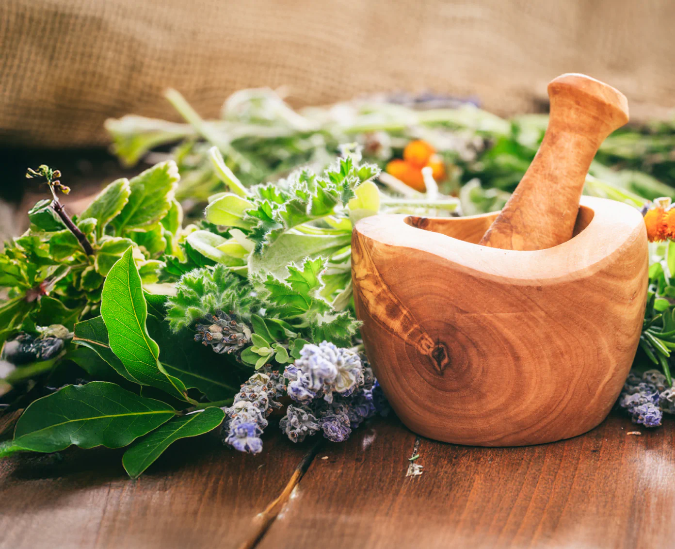 Hands forming shield around glowing liver, symbolizing liver protection